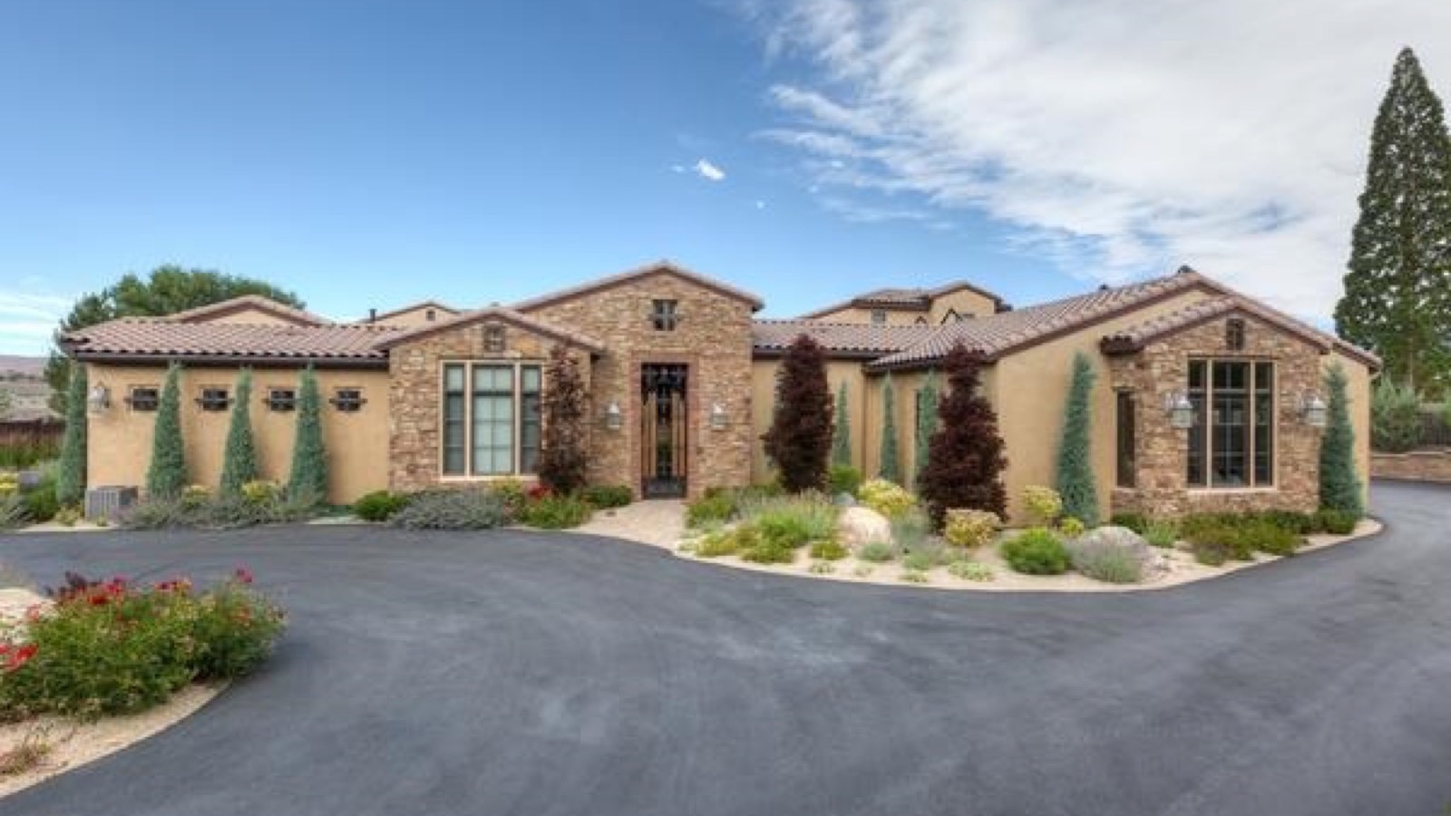 Master-planned Reno neighborhood with contemporary homes, trails, and the Sierra Nevada foothills behind